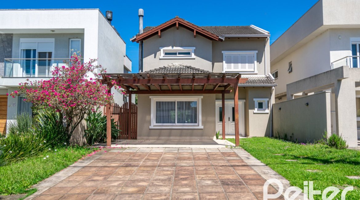 Casa em Condomínio à venda com 217m², 3 dormitórios, 1 suíte, 2 vagas, no bairro Terra Ville em Porto Alegre
