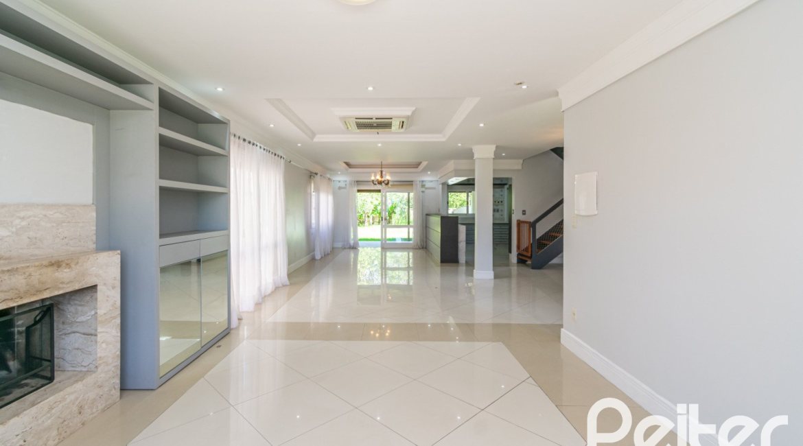 Casa em Condomínio à venda com 217m², 3 dormitórios, 1 suíte, 2 vagas, no bairro Terra Ville em Porto Alegre