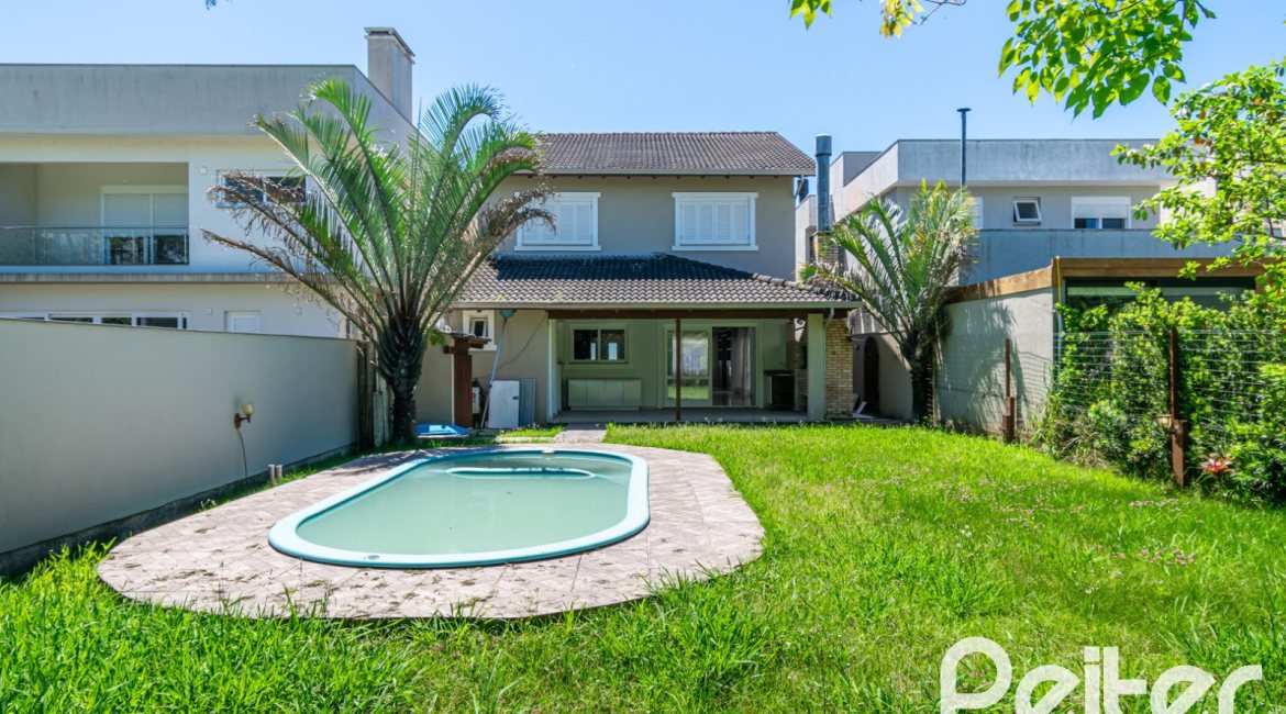 Casa em Condomínio à venda com 217m², 3 dormitórios, 1 suíte, 2 vagas, no bairro Terra Ville em Porto Alegre