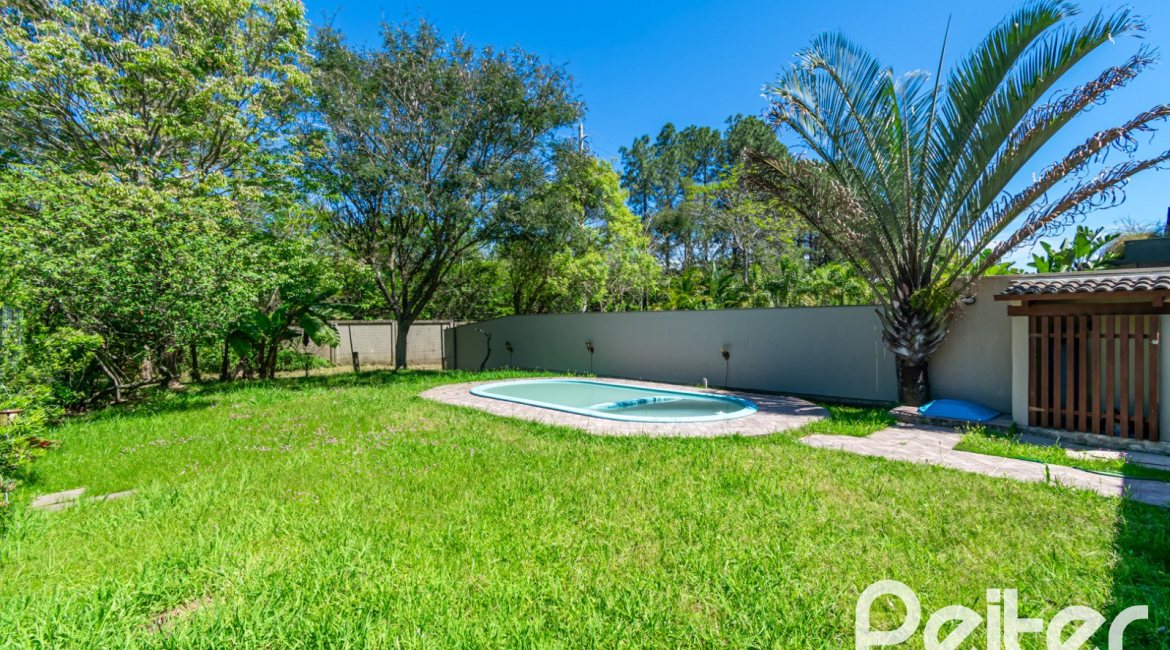 Casa em Condomínio à venda com 217m², 3 dormitórios, 1 suíte, 2 vagas, no bairro Terra Ville em Porto Alegre