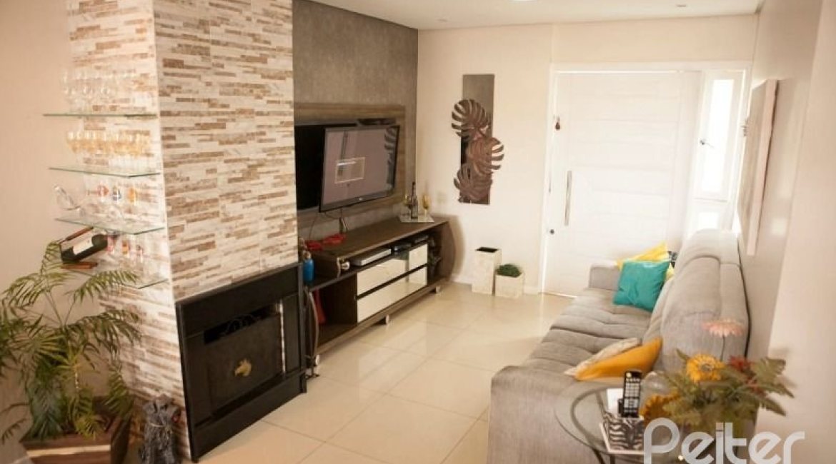 Casa em Condomínio à venda com 132m², 3 dormitórios, 1 suíte, 2 vagas, no bairro Vila Nova em PORTO ALEGRE