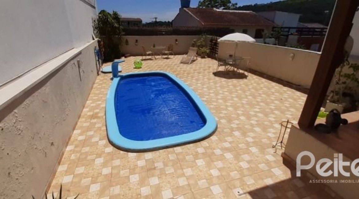 Casa em Condomínio à venda com 132m², 3 dormitórios, 1 suíte, 2 vagas, no bairro Vila Nova em PORTO ALEGRE