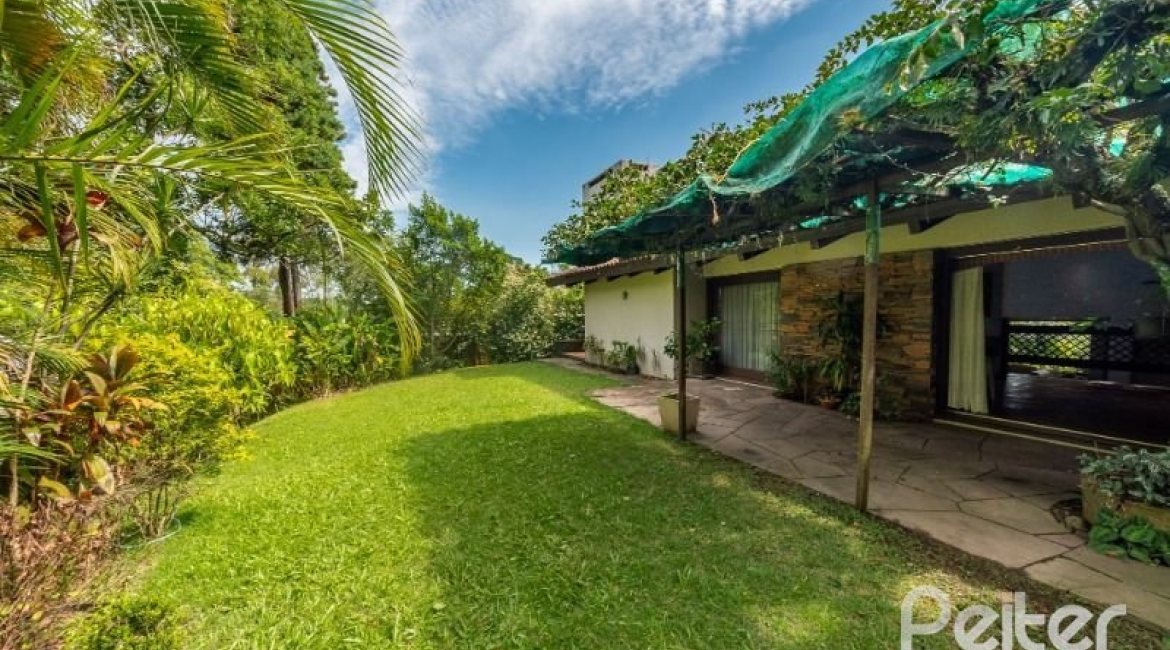 Casa em Condomínio à venda com 654m², 5 dormitórios, 5 suítes, 4 vagas, no bairro Cavalhada em PORTO ALEGRE