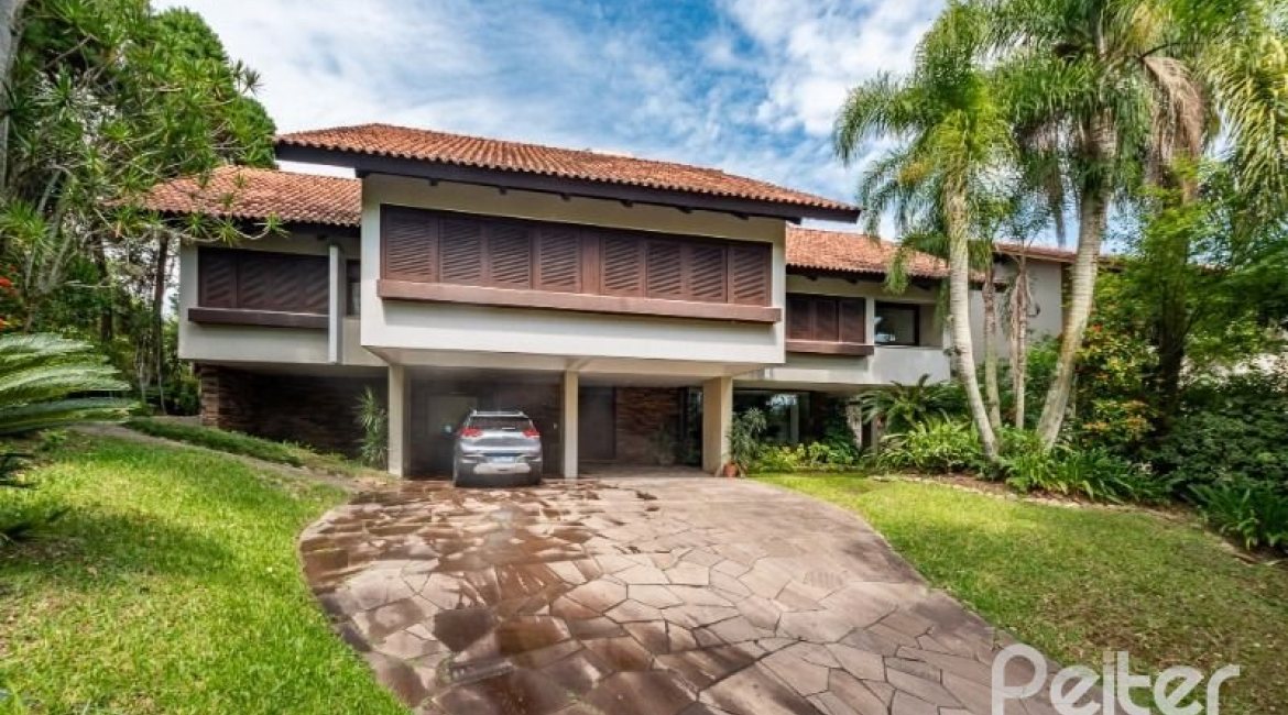 Casa em Condomínio à venda com 654m², 5 dormitórios, 5 suítes, 4 vagas, no bairro Cavalhada em PORTO ALEGRE