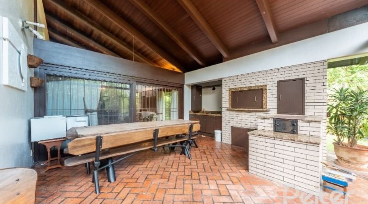 Casa em Condomínio à venda com 654m², 5 dormitórios, 5 suítes, 4 vagas, no bairro Cavalhada em PORTO ALEGRE