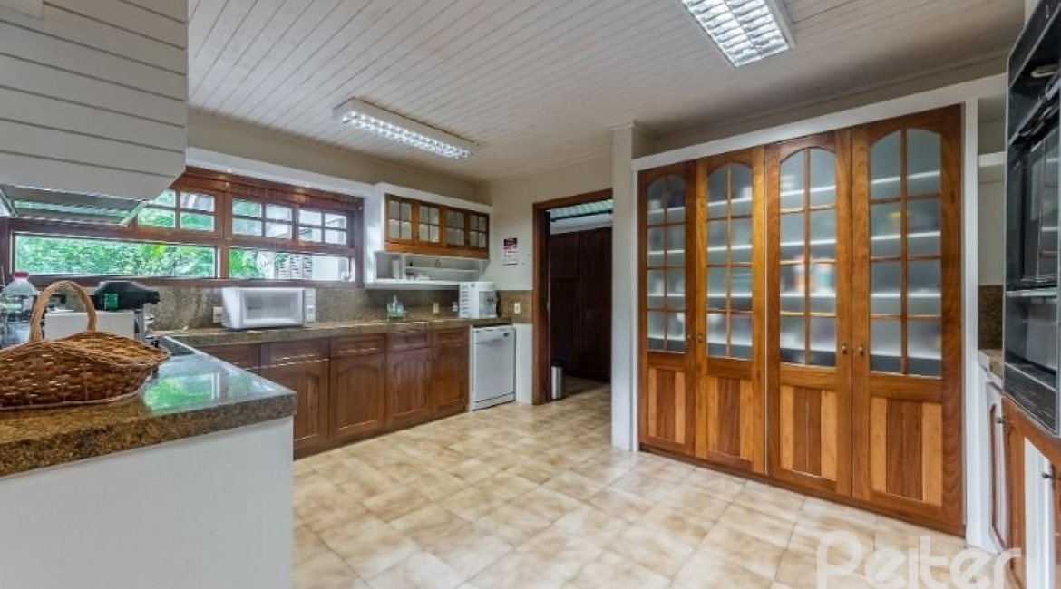 Casa em Condomínio à venda com 654m², 5 dormitórios, 5 suítes, 4 vagas, no bairro Cavalhada em PORTO ALEGRE