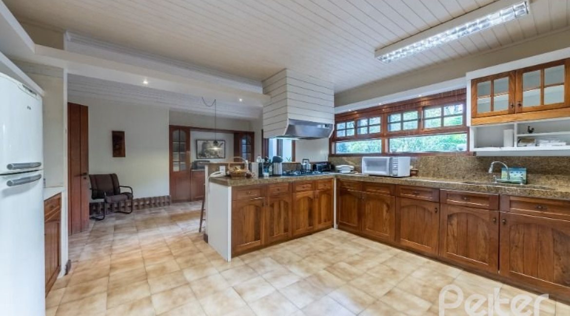 Casa em Condomínio à venda com 654m², 5 dormitórios, 5 suítes, 4 vagas, no bairro Cavalhada em PORTO ALEGRE