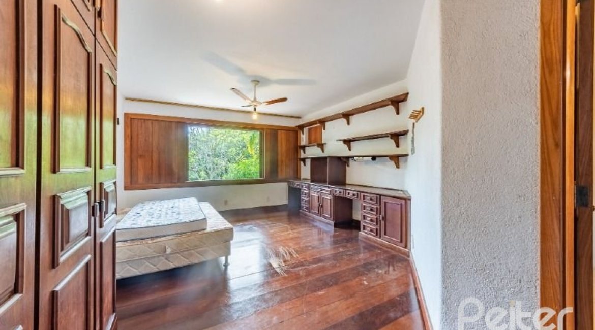 Casa em Condomínio à venda com 654m², 5 dormitórios, 5 suítes, 4 vagas, no bairro Cavalhada em PORTO ALEGRE