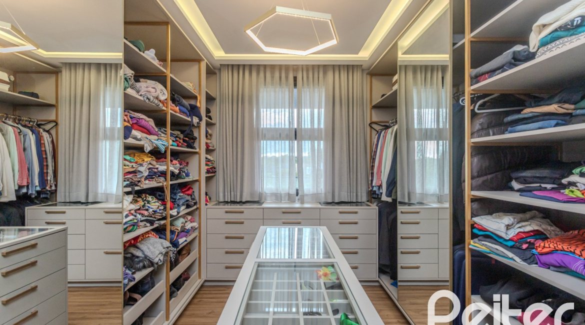 Casa em Condomínio à venda com 359m², 4 dormitórios, 4 suítes, 4 vagas, no bairro Alphaville em PORTO ALEGRE