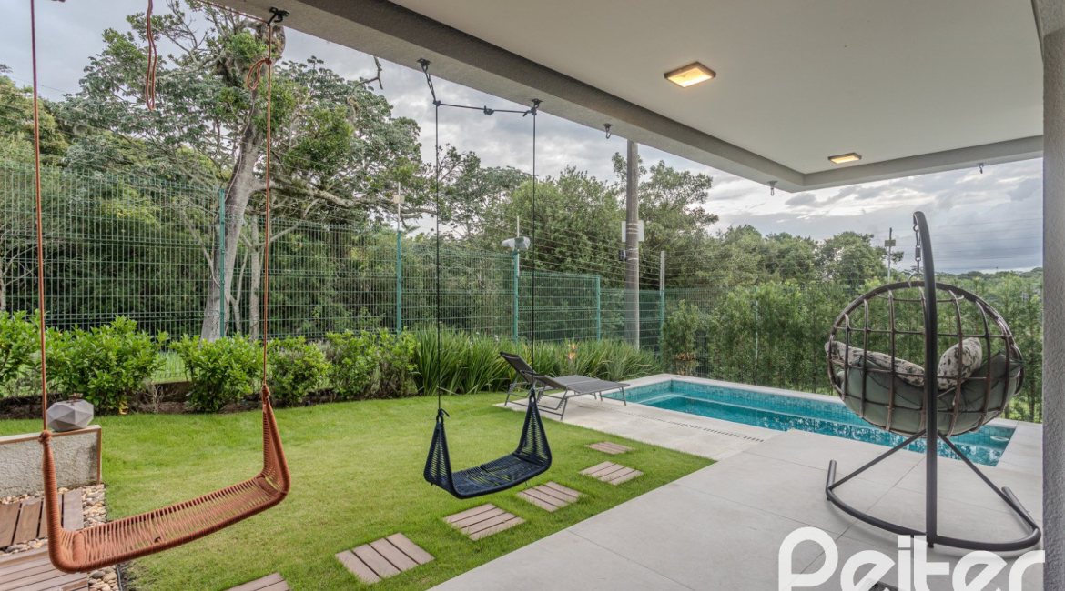 Casa em Condomínio à venda com 359m², 4 dormitórios, 4 suítes, 4 vagas, no bairro Alphaville em PORTO ALEGRE