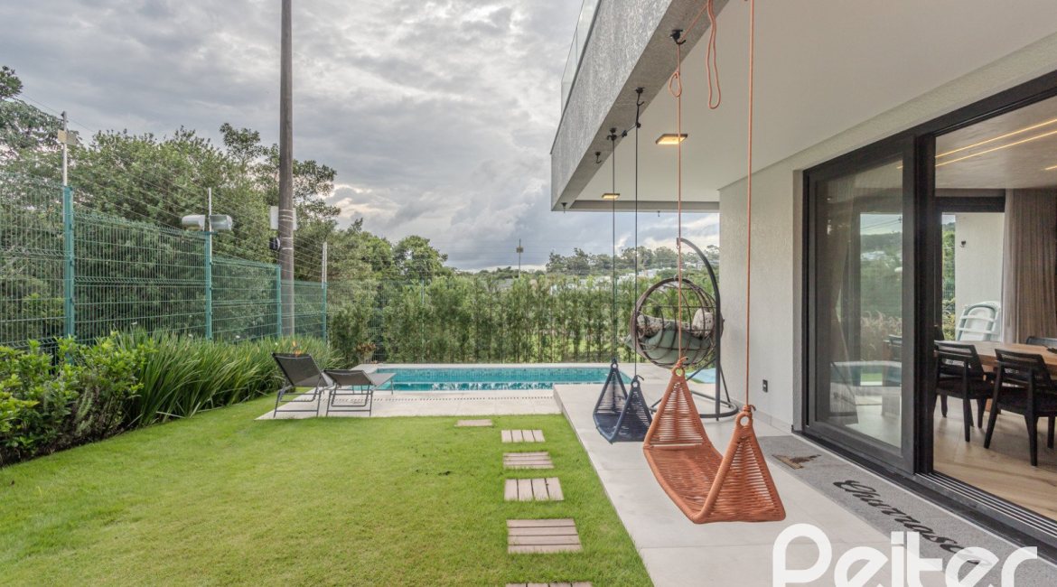 Casa em Condomínio à venda com 359m², 4 dormitórios, 4 suítes, 4 vagas, no bairro Alphaville em PORTO ALEGRE