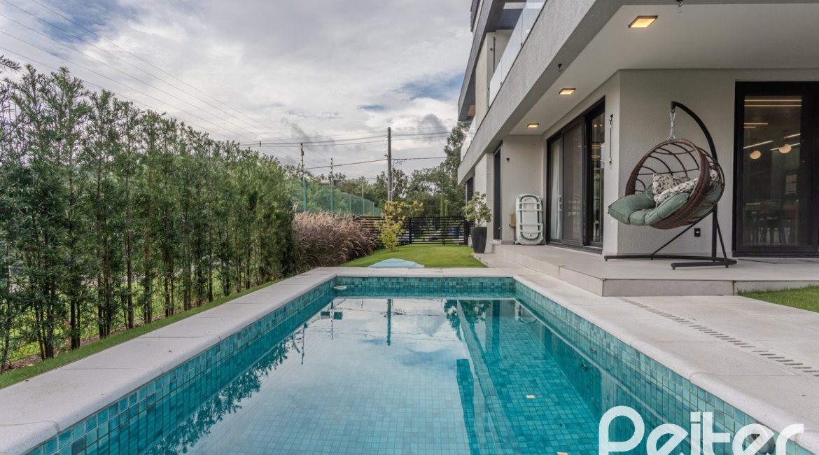 Casa em Condomínio à venda com 359m², 4 dormitórios, 4 suítes, 4 vagas, no bairro Alphaville em PORTO ALEGRE