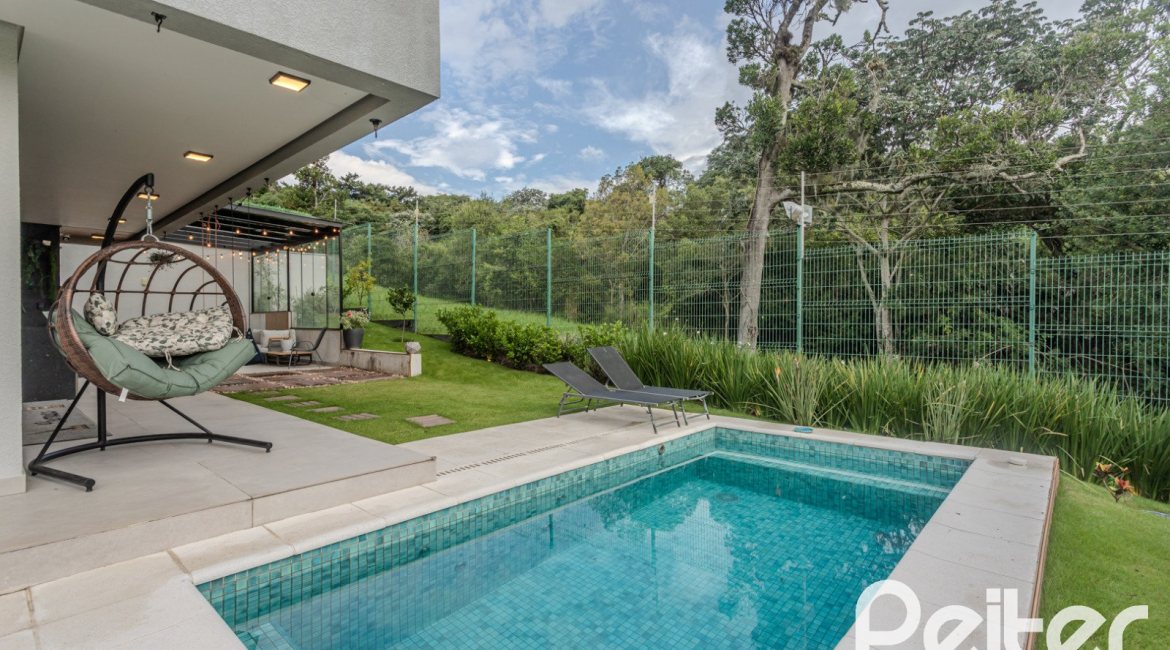 Casa em Condomínio à venda com 359m², 4 dormitórios, 4 suítes, 4 vagas, no bairro Alphaville em PORTO ALEGRE