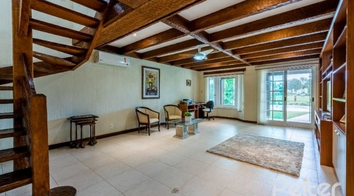 Casa em Condomínio à venda com 449m², 3 dormitórios, 3 suítes, 6 vagas, no bairro Terra Ville em PORTO ALEGRE