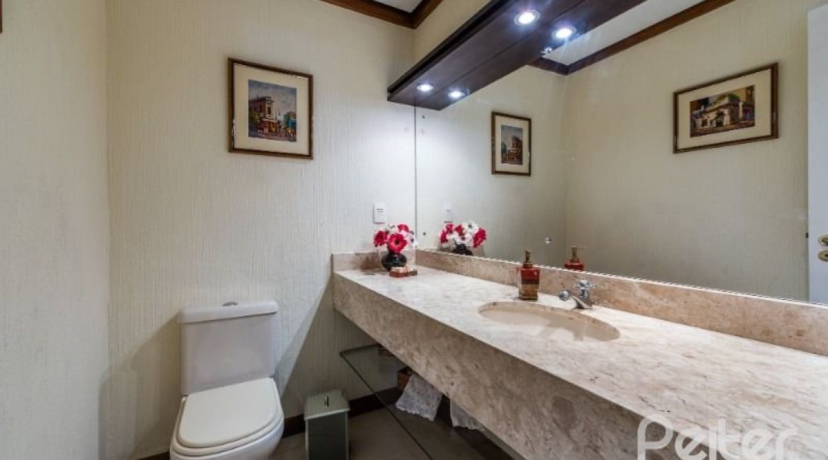 Casa em Condomínio à venda com 449m², 3 dormitórios, 3 suítes, 6 vagas, no bairro Terra Ville em PORTO ALEGRE