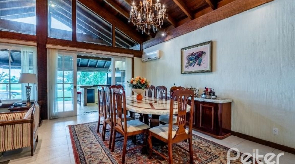 Casa em Condomínio à venda com 449m², 3 dormitórios, 3 suítes, 6 vagas, no bairro Terra Ville em PORTO ALEGRE