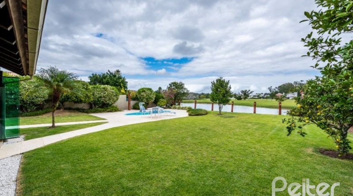 Casa em Condomínio à venda com 449m², 3 dormitórios, 3 suítes, 6 vagas, no bairro Terra Ville em PORTO ALEGRE