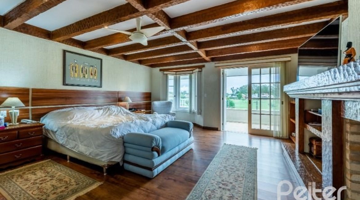 Casa em Condomínio à venda com 449m², 3 dormitórios, 3 suítes, 6 vagas, no bairro Terra Ville em PORTO ALEGRE