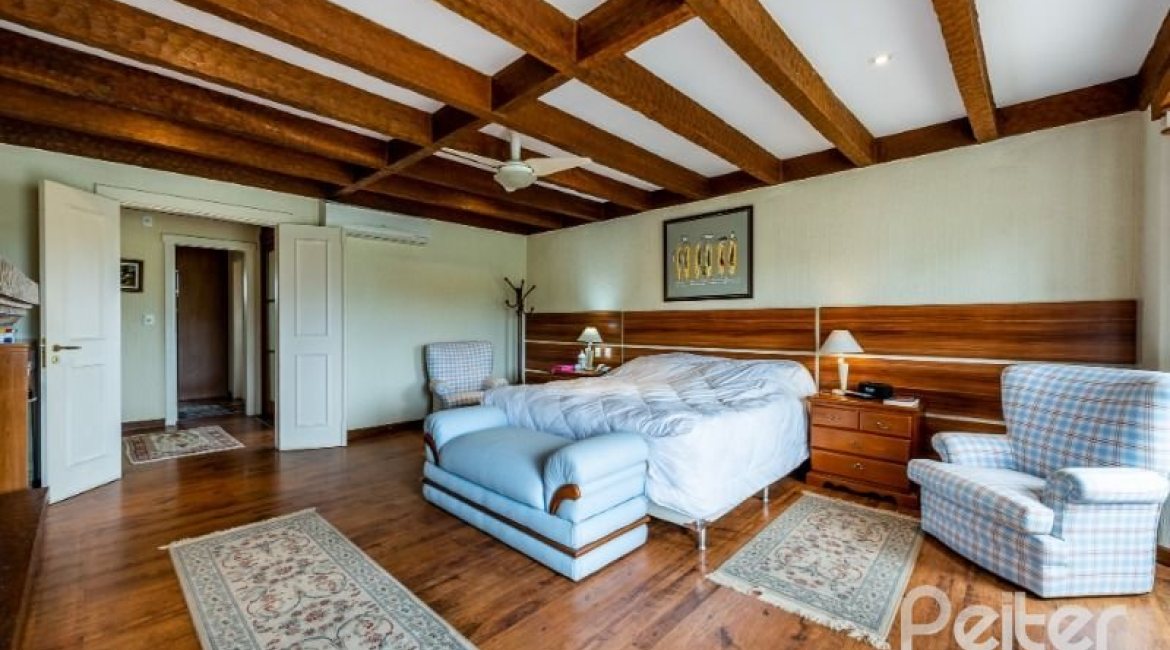 Casa em Condomínio à venda com 449m², 3 dormitórios, 3 suítes, 6 vagas, no bairro Terra Ville em PORTO ALEGRE