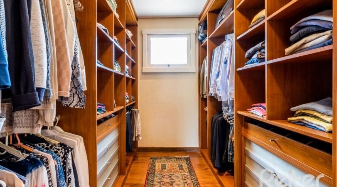 Casa em Condomínio à venda com 449m², 3 dormitórios, 3 suítes, 6 vagas, no bairro Terra Ville em PORTO ALEGRE