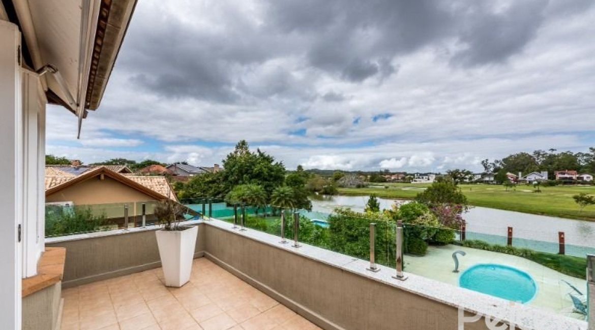 Casa em Condomínio à venda com 449m², 3 dormitórios, 3 suítes, 6 vagas, no bairro Terra Ville em PORTO ALEGRE