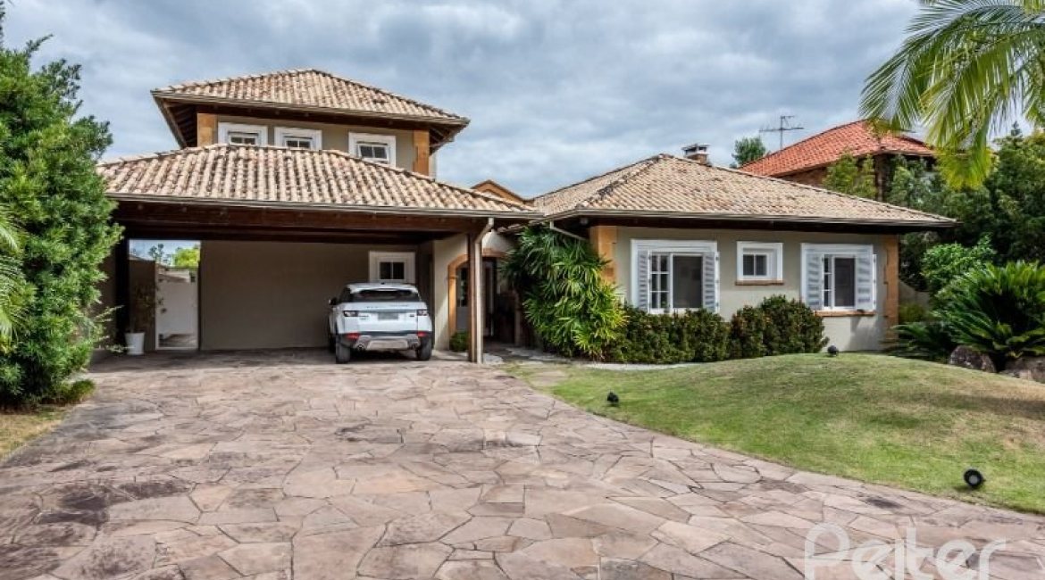 Casa em Condomínio à venda com 449m², 3 dormitórios, 3 suítes, 6 vagas, no bairro Terra Ville em PORTO ALEGRE