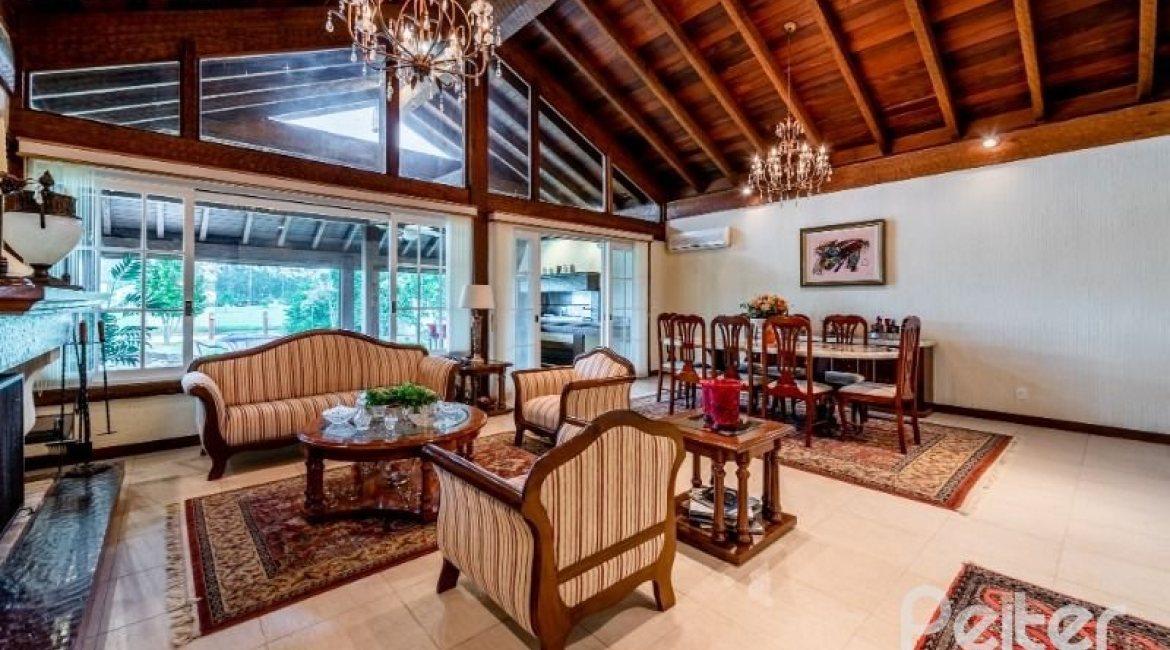 Casa em Condomínio à venda com 449m², 3 dormitórios, 3 suítes, 6 vagas, no bairro Terra Ville em PORTO ALEGRE