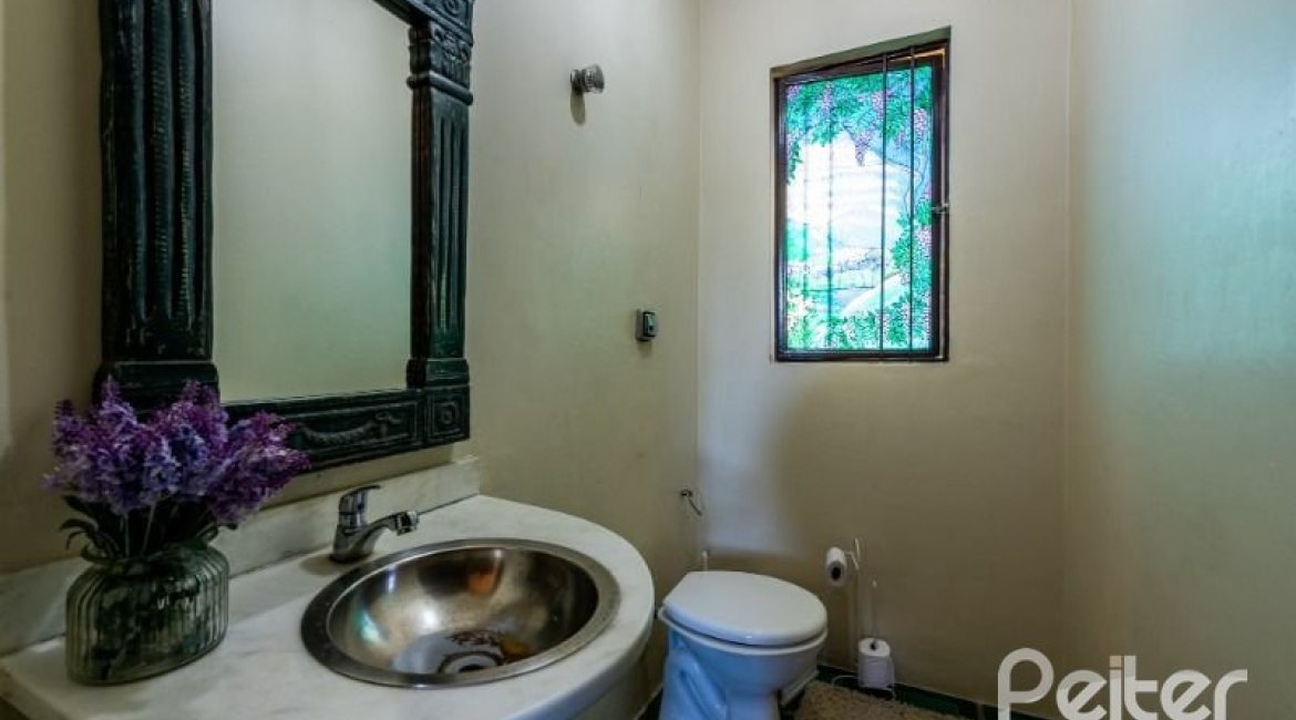 Casa em Condomínio à venda com 400m², 5 dormitórios, 2 suítes, 3 vagas, no bairro Cavalhada em PORTO ALEGRE