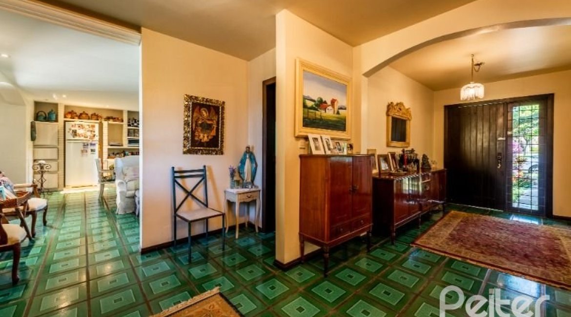 Casa em Condomínio à venda com 400m², 5 dormitórios, 2 suítes, 3 vagas, no bairro Cavalhada em PORTO ALEGRE