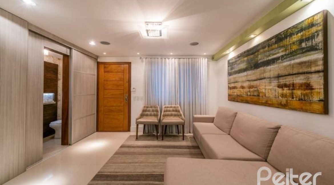 Casa em Condomínio à venda com 296m², 3 dormitórios, 1 suíte, 2 vagas, no bairro Vila Assunção em Porto Alegre