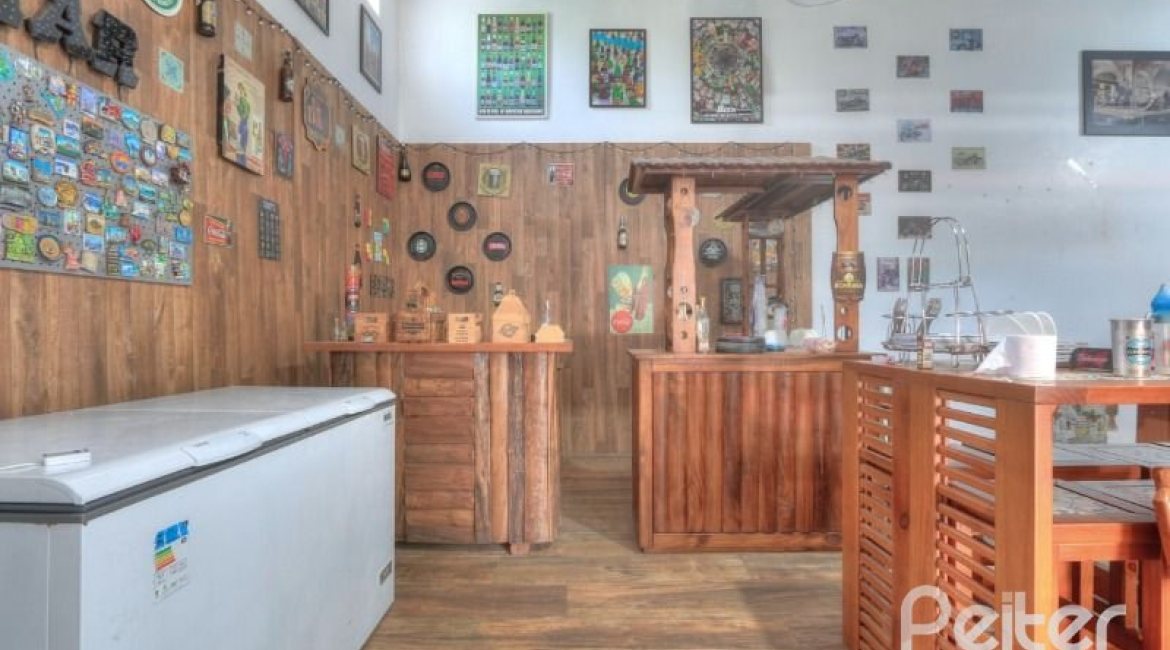 Casa à venda com 323m², 5 dormitórios, 3 suítes, 4 vagas, no bairro Tristeza em Porto Alegre