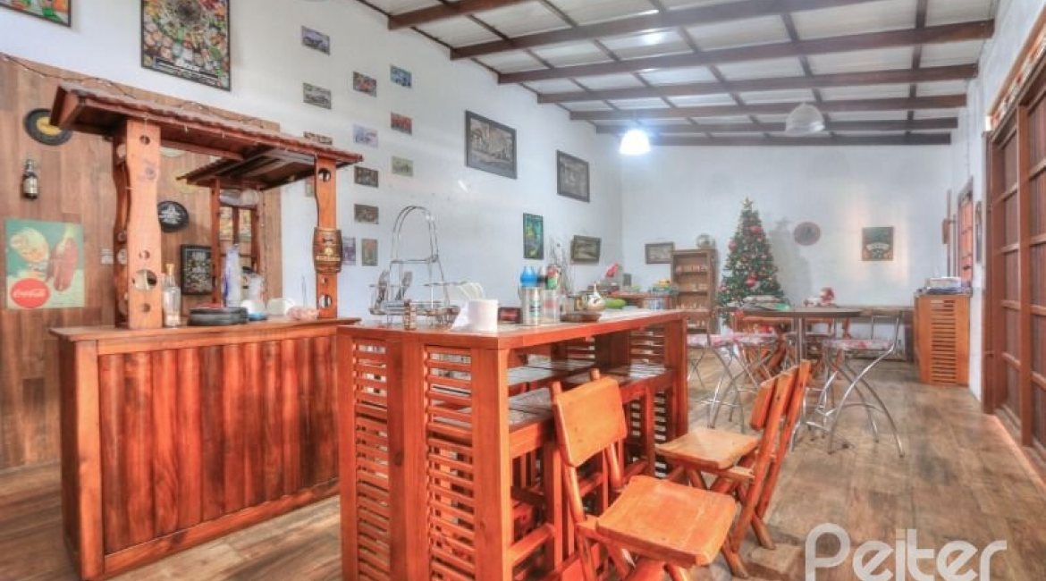 Casa à venda com 323m², 5 dormitórios, 3 suítes, 4 vagas, no bairro Tristeza em Porto Alegre