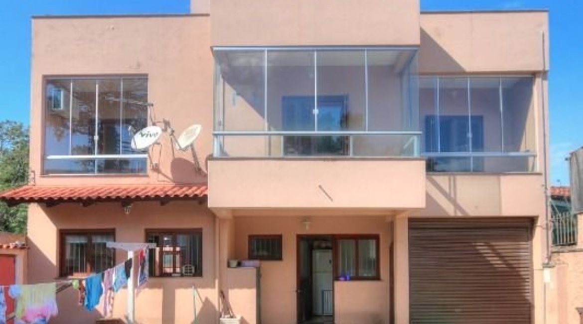 Casa à venda com 323m², 5 dormitórios, 3 suítes, 4 vagas, no bairro Tristeza em Porto Alegre
