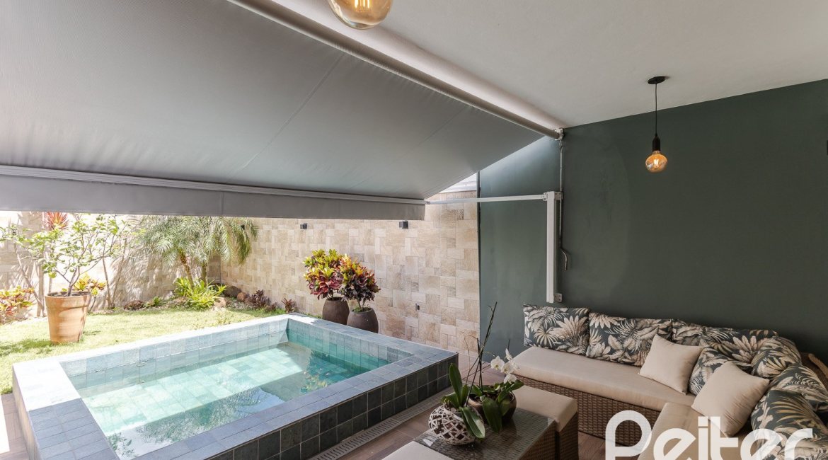 Casa em Condomínio à venda com 185m², 3 dormitórios, 1 suíte, 2 vagas, no bairro Vila Nova em PORTO ALEGRE