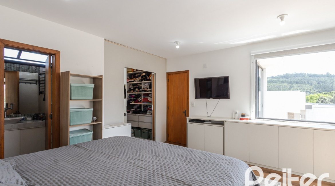 Casa em Condomínio à venda com 185m², 3 dormitórios, 1 suíte, 2 vagas, no bairro Vila Nova em PORTO ALEGRE