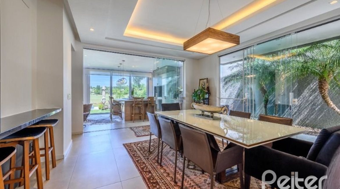 Casa em Condomínio à venda com 339m², 4 dormitórios, 4 suítes, 4 vagas, no bairro Terra Ville em PORTO ALEGRE