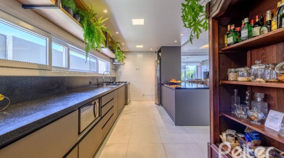 Casa em Condomínio à venda com 339m², 4 dormitórios, 4 suítes, 4 vagas, no bairro Terra Ville em PORTO ALEGRE