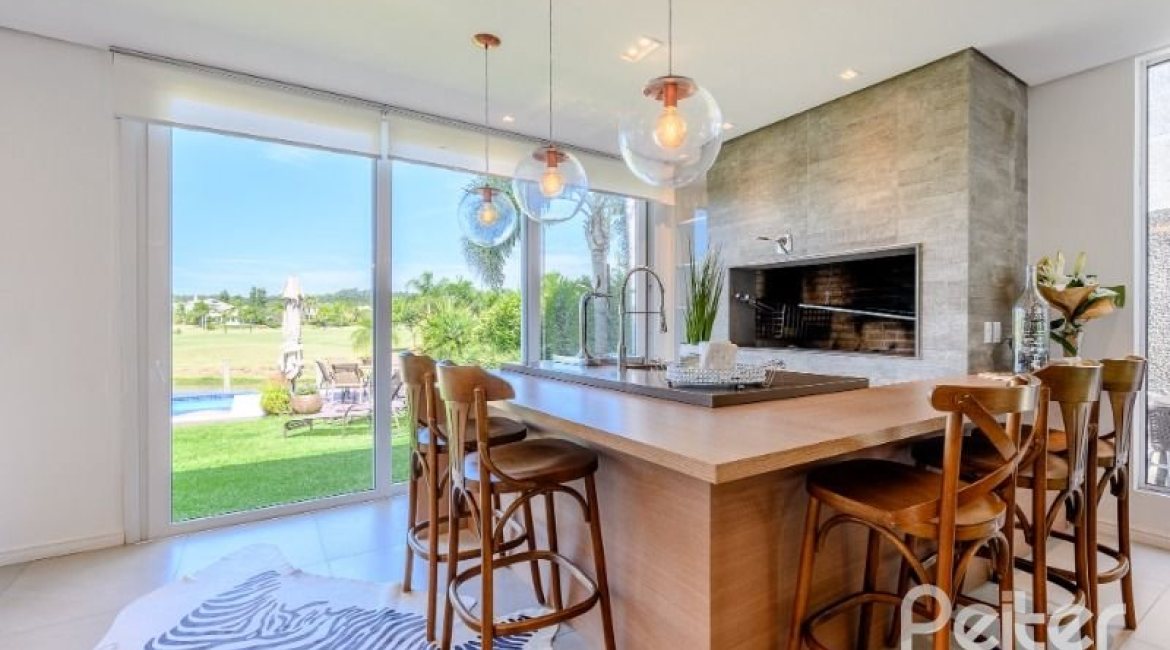 Casa em Condomínio à venda com 339m², 4 dormitórios, 4 suítes, 4 vagas, no bairro Terra Ville em PORTO ALEGRE