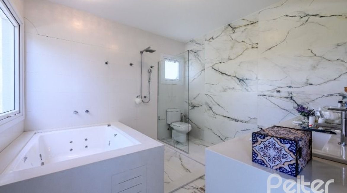 Casa em Condomínio à venda com 339m², 4 dormitórios, 4 suítes, 4 vagas, no bairro Terra Ville em PORTO ALEGRE