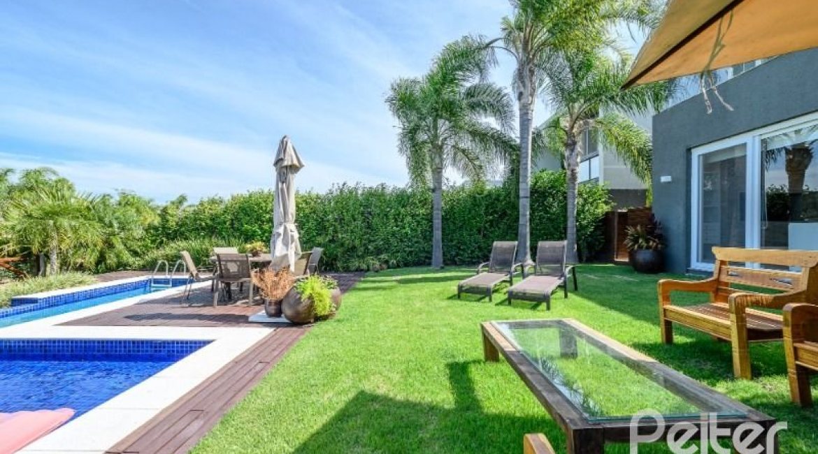 Casa em Condomínio à venda com 339m², 4 dormitórios, 4 suítes, 4 vagas, no bairro Terra Ville em PORTO ALEGRE