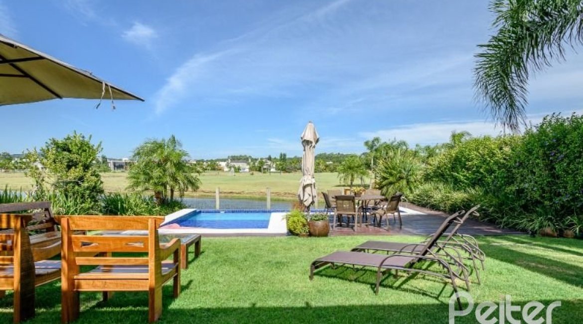 Casa em Condomínio à venda com 339m², 4 dormitórios, 4 suítes, 4 vagas, no bairro Terra Ville em PORTO ALEGRE