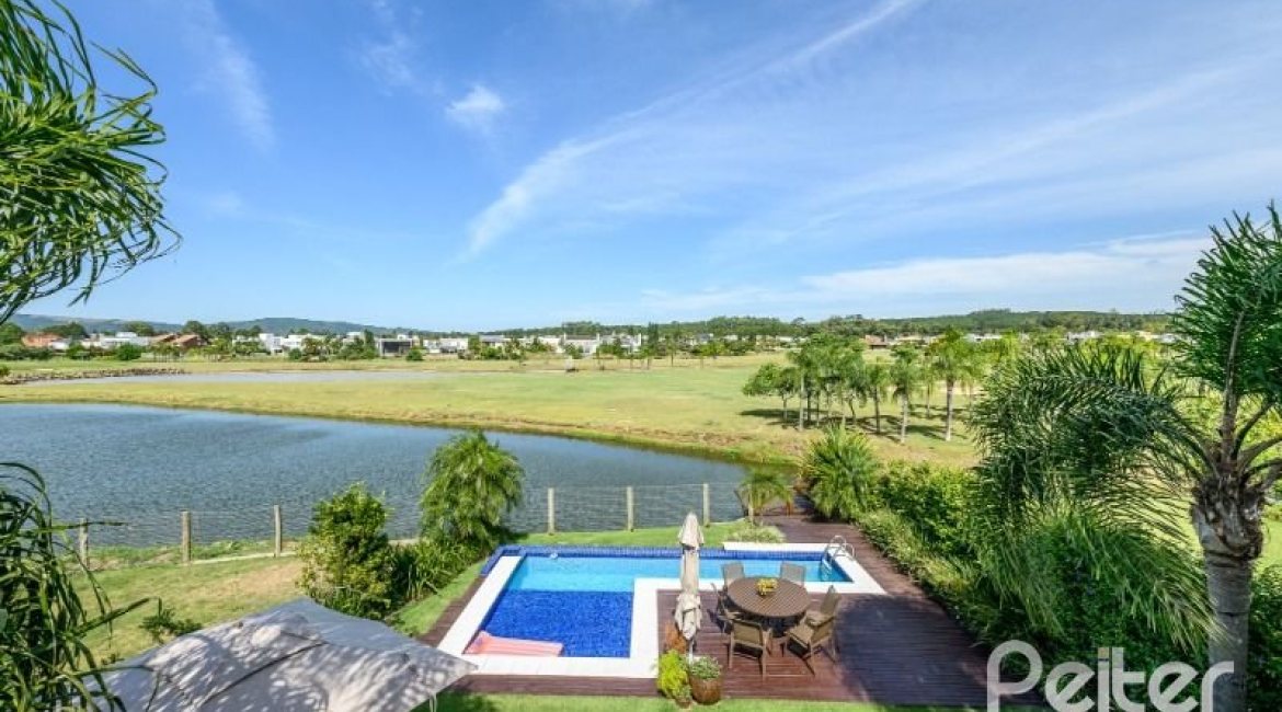 Casa em Condomínio à venda com 339m², 4 dormitórios, 4 suítes, 4 vagas, no bairro Terra Ville em PORTO ALEGRE