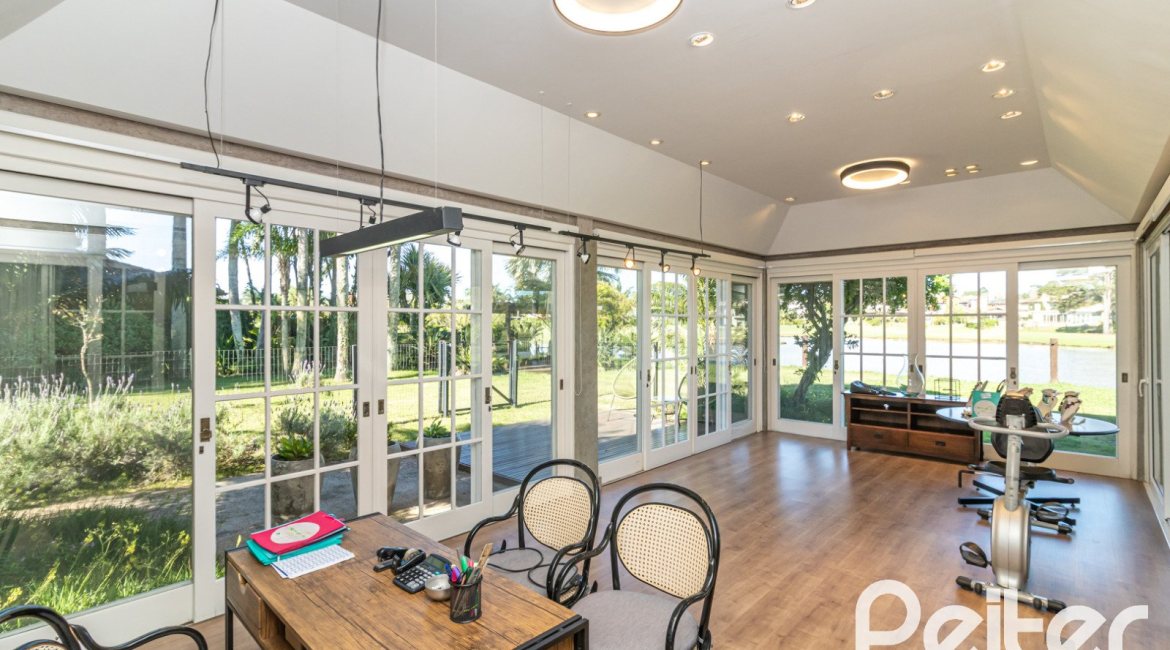 Casa em Condomínio à venda com 533m², 4 dormitórios, 2 suítes, 6 vagas, no bairro Terra Ville em PORTO ALEGRE