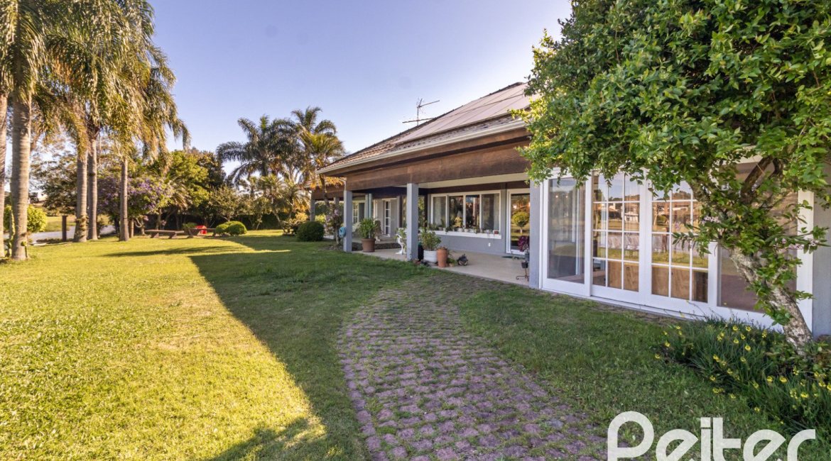 Casa em Condomínio à venda com 533m², 4 dormitórios, 2 suítes, 6 vagas, no bairro Terra Ville em PORTO ALEGRE
