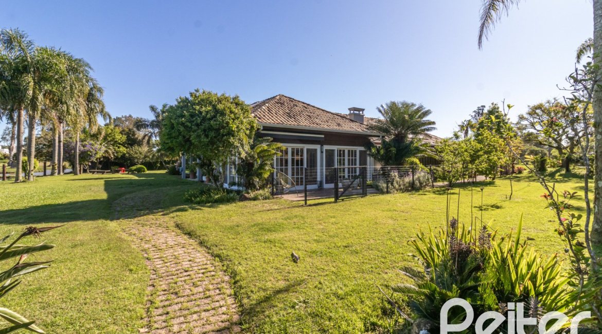 Casa em Condomínio à venda com 533m², 4 dormitórios, 2 suítes, 6 vagas, no bairro Terra Ville em PORTO ALEGRE