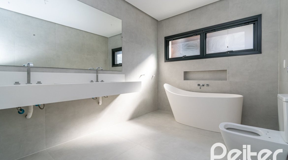 Casa em Condomínio à venda com 389m², 4 dormitórios, 4 suítes, 4 vagas, no bairro Terra Ville em PORTO ALEGRE