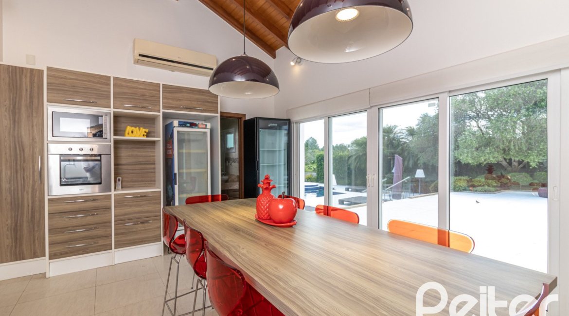 Casa em Condomínio à venda com 445m², 4 dormitórios, 4 suítes, 4 vagas, no bairro Terra Ville em Porto Alegre