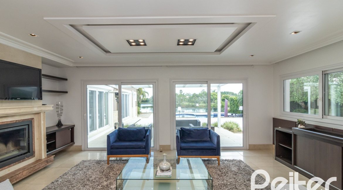 Casa em Condomínio à venda com 445m², 4 dormitórios, 4 suítes, 4 vagas, no bairro Terra Ville em Porto Alegre