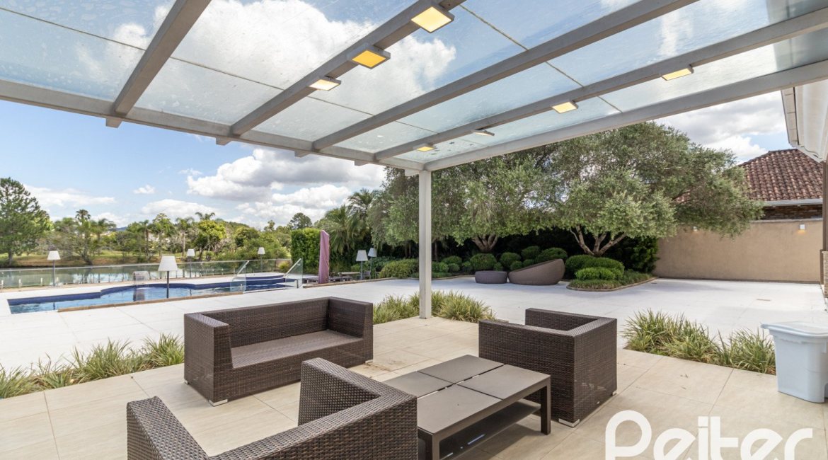 Casa em Condomínio à venda com 445m², 4 dormitórios, 4 suítes, 4 vagas, no bairro Terra Ville em Porto Alegre