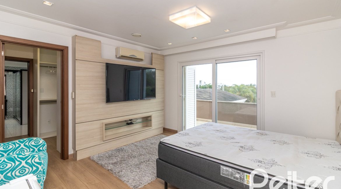 Casa em Condomínio à venda com 445m², 4 dormitórios, 4 suítes, 4 vagas, no bairro Terra Ville em Porto Alegre